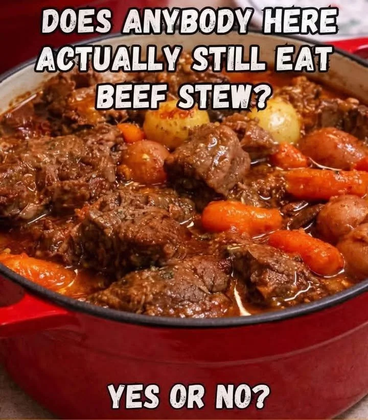 Bowl of old-fashioned beef stew made from Grandma's recipe, garnished with herbs.